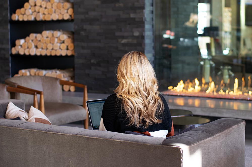 Highline Vail Hotel Girl in Lobby on Computer Lifestyle