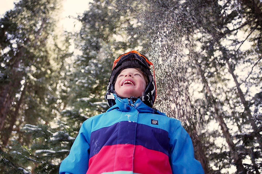 Vail Lifestyle Happy Boy in Winter Forest